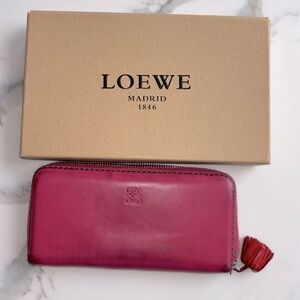 Loewe pink wallet with aubergine leather interior. In Preloved condition.